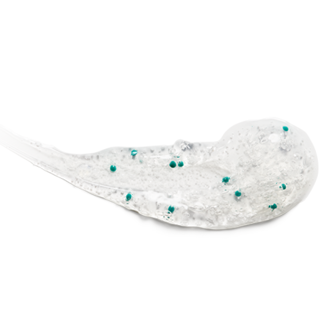 Clear exfoliating gel with small green beads for normal to oily skin on white background