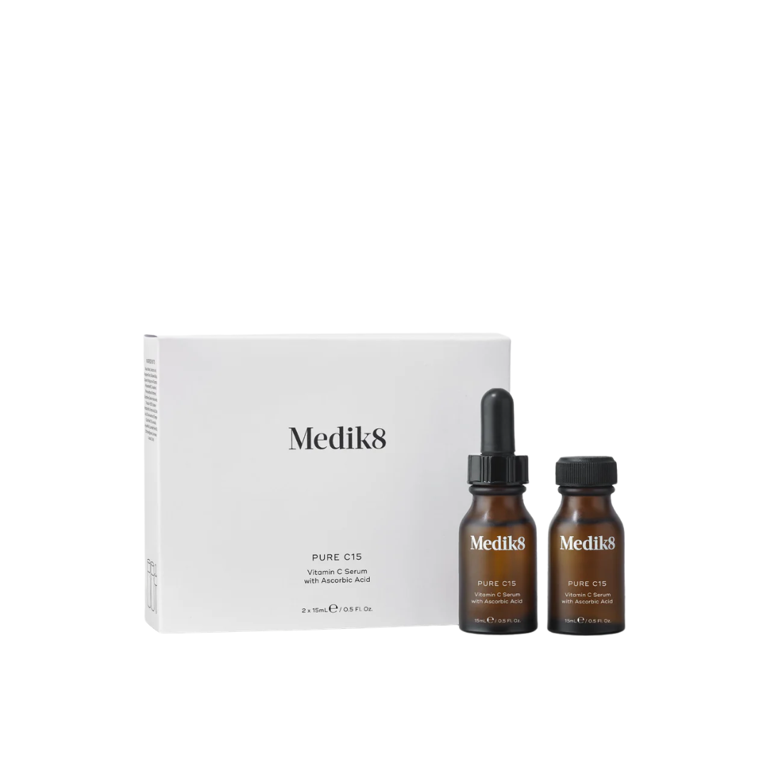 Medik8 Pure C15 vitamin C serum set with dropper bottle and packaging, skincare product