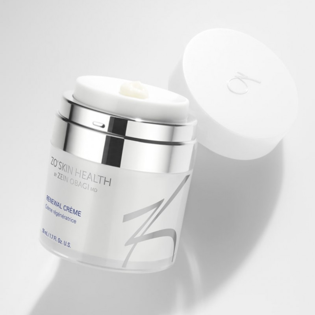 Open jar of ZO Skin Health Renewal Crème with white lid and silver accents on white background