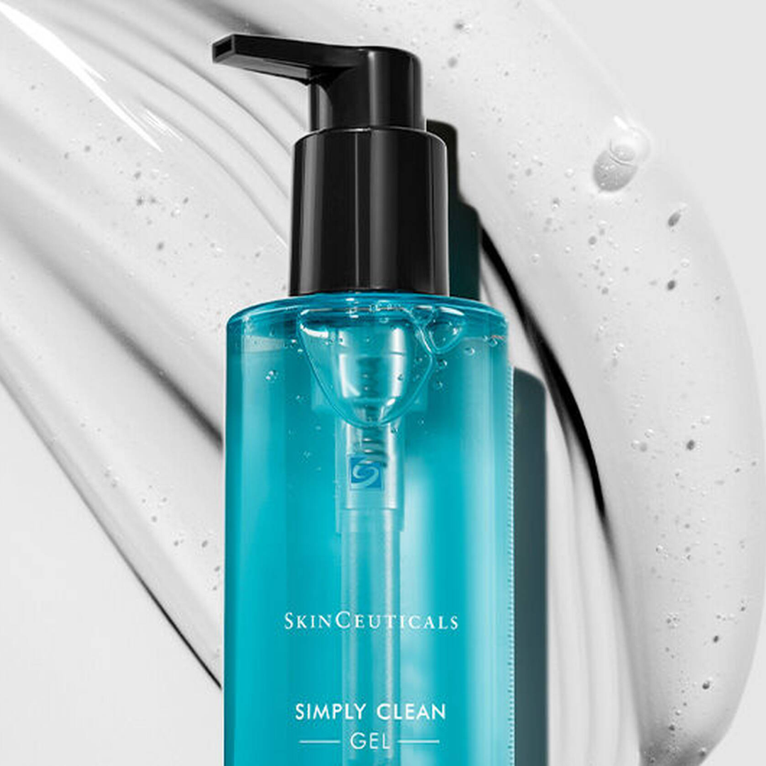 SkinCeuticals Simply Clean Gel cleanser in blue pump bottle with gel texture background