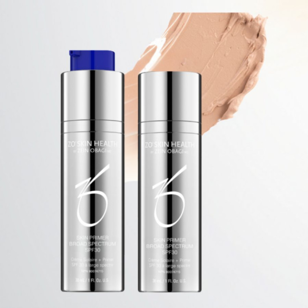 Two silver bottles of ZO Skin Health Skin Primer Broad Spectrum SPF30 with beige cream swatch background